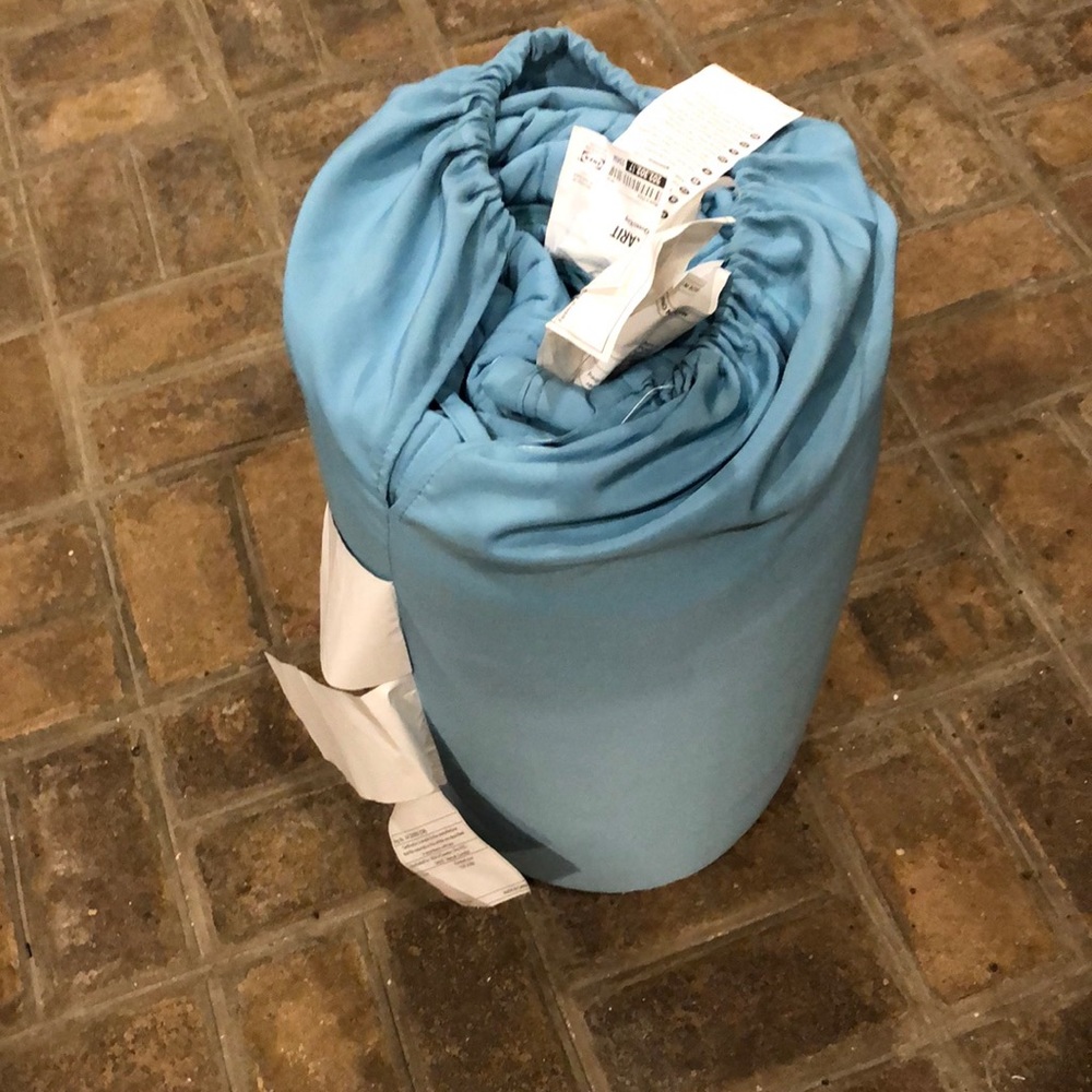 NWT IKEA Karit quilted cover size queen/king.  Reversible 2 colors of blue